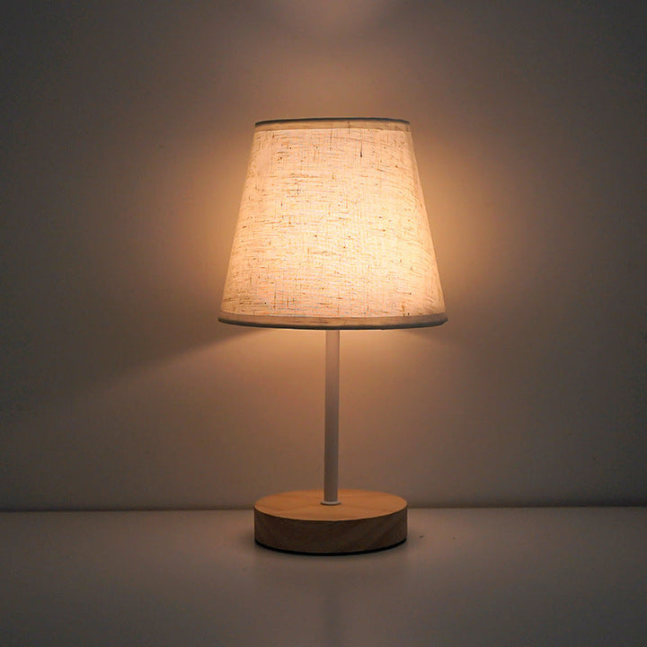 Modern Minimalist Trapezoidal Solid Wood Fabric LED Table Lamp For Bedroom