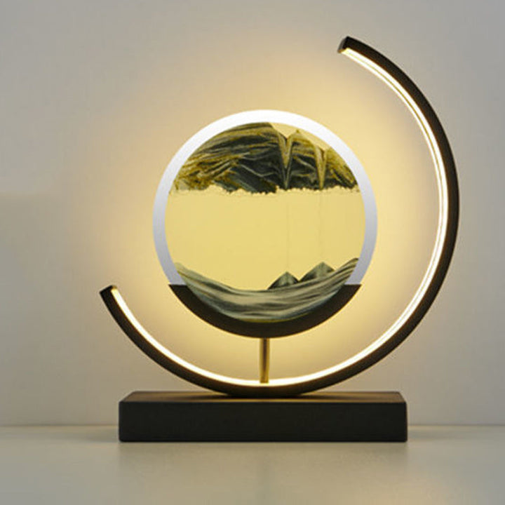 Modern Art Deco Round Quicksand Iron Glass LED Table Lamp For Bedroom