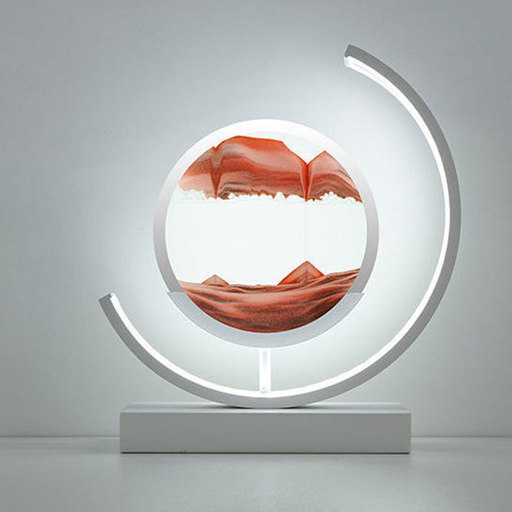 Modern Art Deco Round Quicksand Iron Glass LED Table Lamp For Bedroom