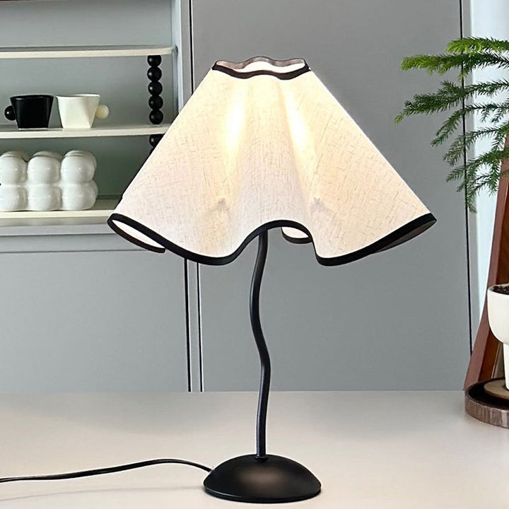Contemporary Creative Fabric Petal Shade Curved Iron Base 1-Light Table Lamp For Bedroom